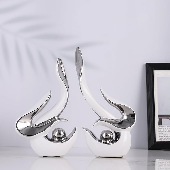White and silver accents, ceramic abstract sculptures and statues, modern art mid century decor coffee table living room dining room table bedroom office home shelving fireplace countertop decor.