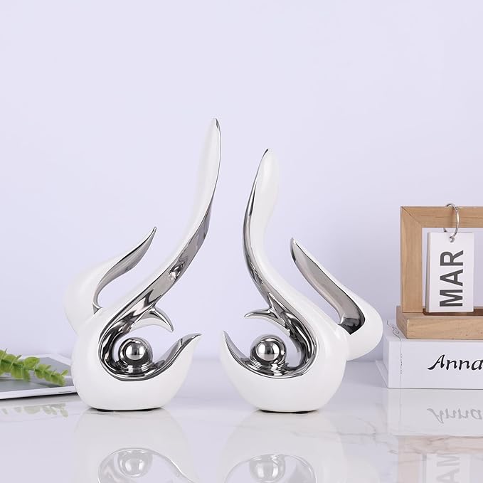 White and silver accents, ceramic abstract sculptures and statues, modern art mid century decor coffee table living room dining room table bedroom office home shelving fireplace countertop decor.
