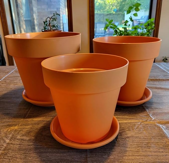 3-Pack 8/9/10 Inch Plastic Plant Pots with Saucers – Durable BPA-Free Planters with 21 Drainage Holes, Raised Bottom Breath and Bottom Watering Design for Indoor & Outdoor – Orange