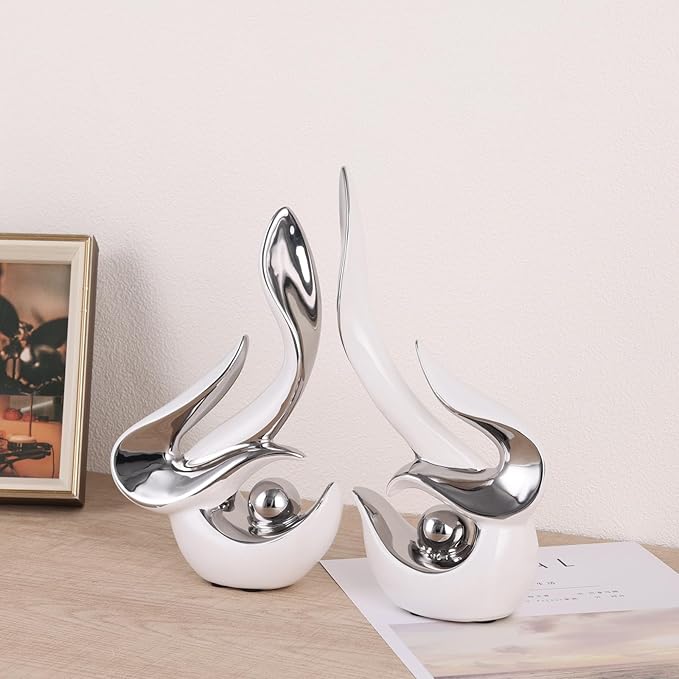 White and silver accents, ceramic abstract sculptures and statues, modern art mid century decor coffee table living room dining room table bedroom office home shelving fireplace countertop decor.