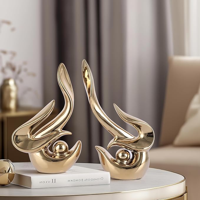 Gold decorative accents, ceramic abstract sculptures and statues, modern art mid century decorative coffee table living room dining room table bedroom office home shelves fireplace countertop decor.