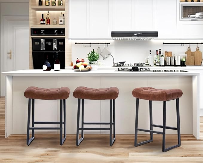 Modern Bar Stools Set of 4 for Kitchen Counter 24 inch Counter Height Backless Barstools with Upholstered Faux Leather Saddle Seat and Metal Frame Industrial Bar Chairs, Brown