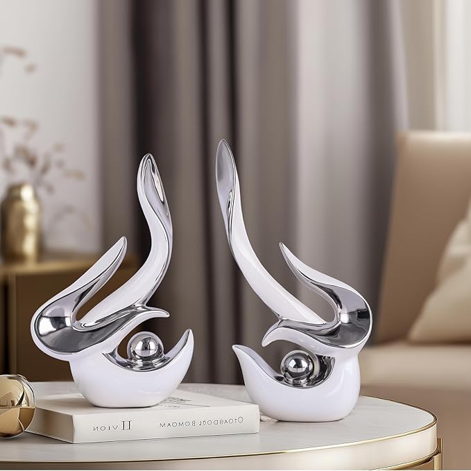 White and silver accents, ceramic abstract sculptures and statues, modern art mid century decor coffee table living room dining room table bedroom office home shelving fireplace countertop decor.