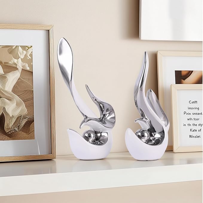 White and silver accents, ceramic abstract sculptures and statues, modern art mid century decor coffee table living room dining room table bedroom office home shelving fireplace countertop decor.