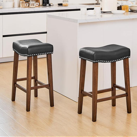 PrimeZone Counter Height Bar Stools Set of 2 - Backless Saddle Barstools with 4.3" Thick Upholstered, Nailhead Trim Faux Leather & Solid Wood Legs, 26 Inch Counter Stools for Kitchen Island, Black