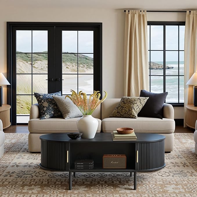 Modern Coffee Table with Storage, 47.2" Oval Fluted Coffee Table with Sliding Doors, Minimalist Tea Table with Wood Grain Veneer, Mid Century Center Tables for Living Room, Apartment, Black