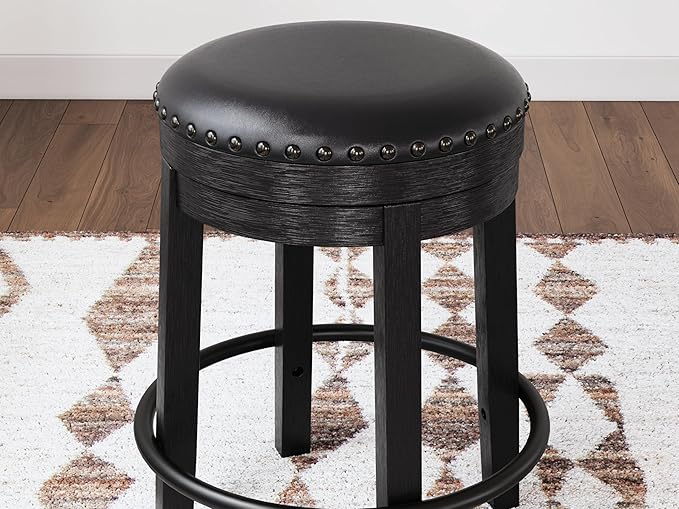 Signature Design by Ashley Valebeck Casual Round Faux Leather Upholstered Backless Counter Height Bar Stool with Footrest and Nailhead Trim, Black